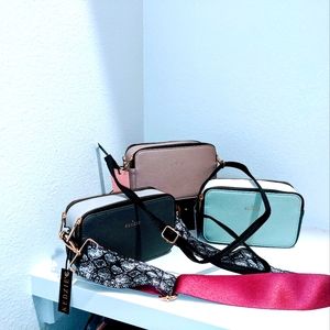 Travel bags with straps